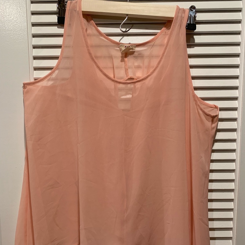 Sheer Sleeves-less top